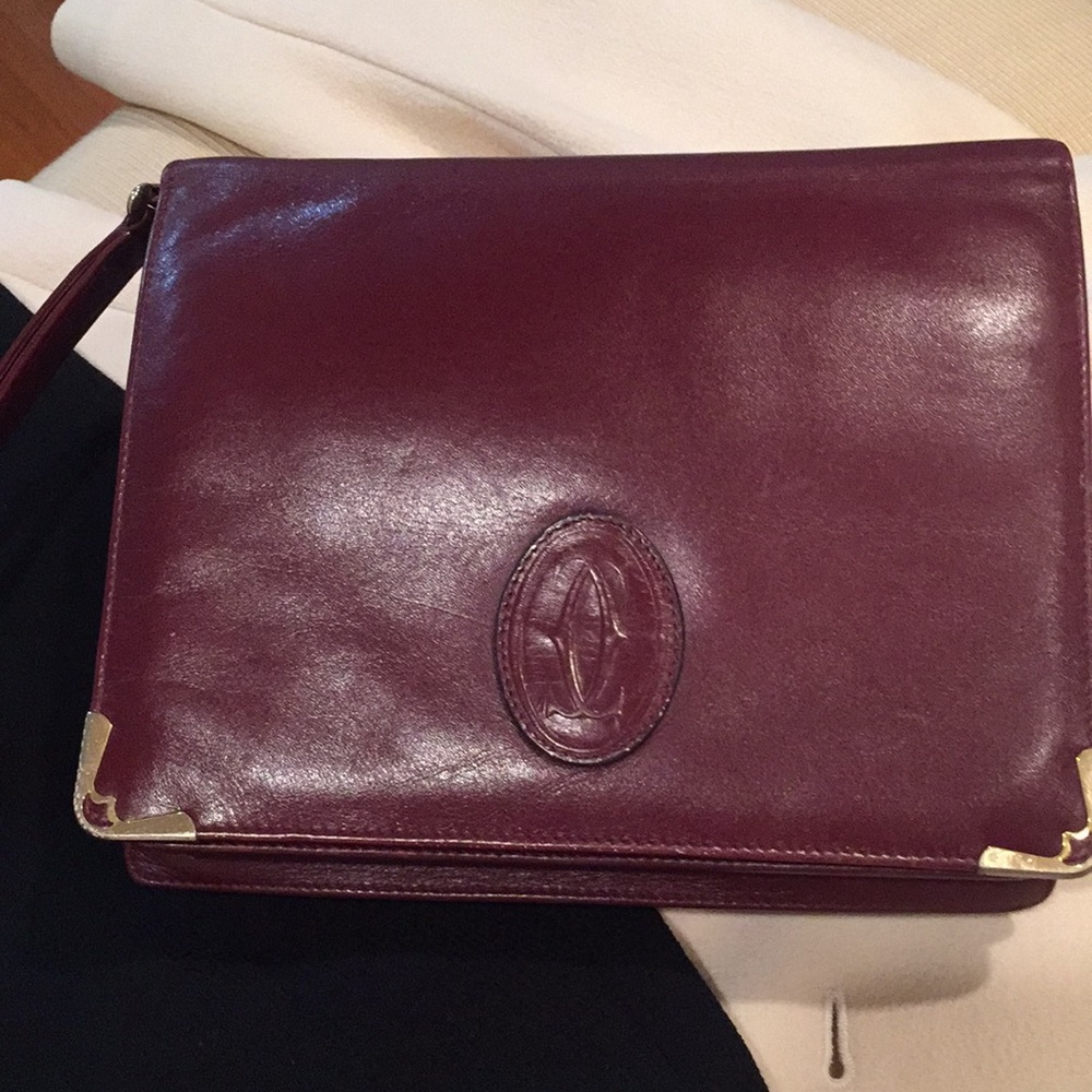 COPY - Cartier wristlet handbag.